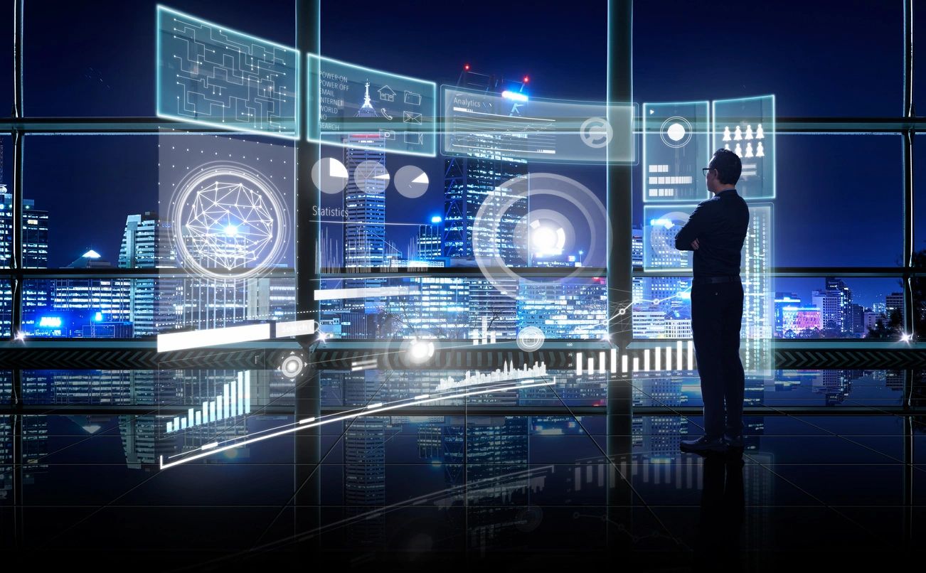 A logistics professional viewing digital business data over a city skyline