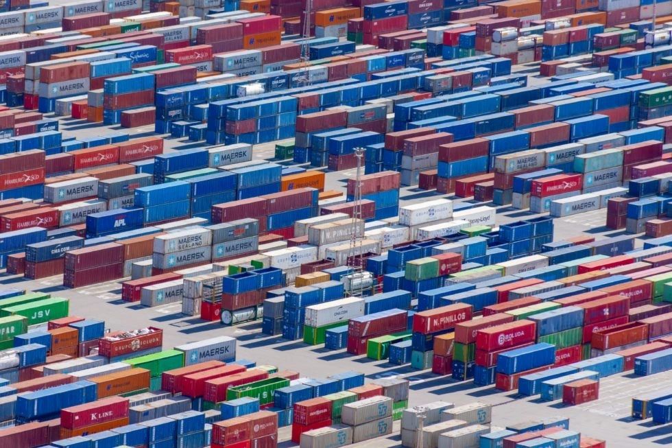 Rows of shipping containers at an ocean freight terminal